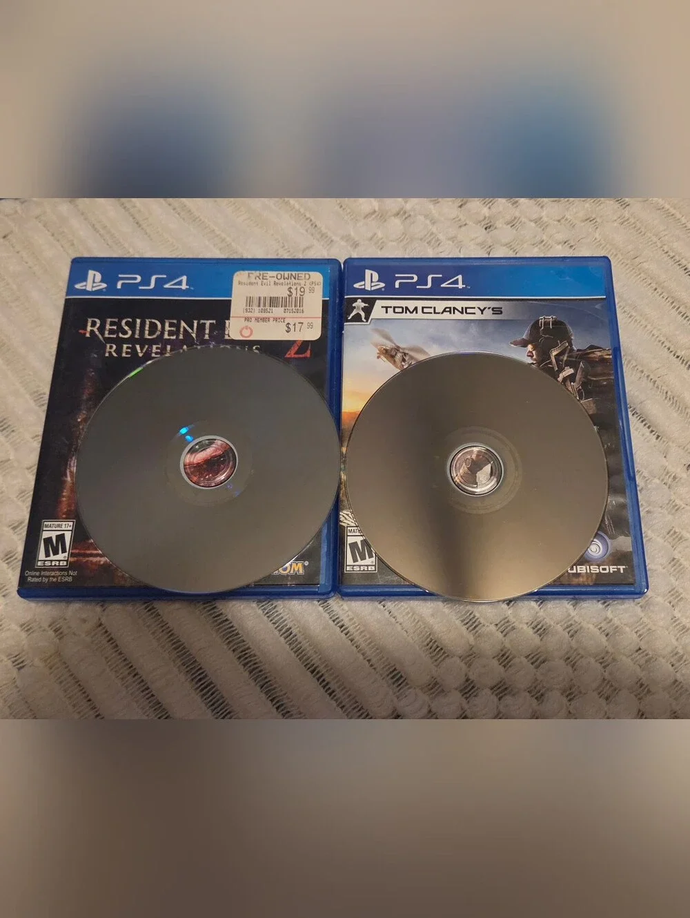 PS4 Game Lot — Blue Cases with Multi-Game Covers